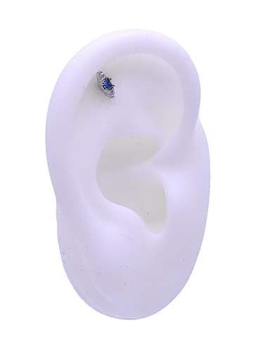 Labret/tragus/helix piercing met blauwe kristal