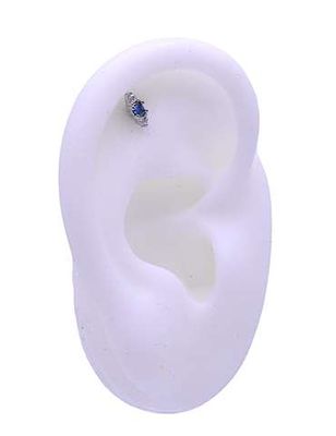 Labret/tragus/helix piercing met blauwe kristal