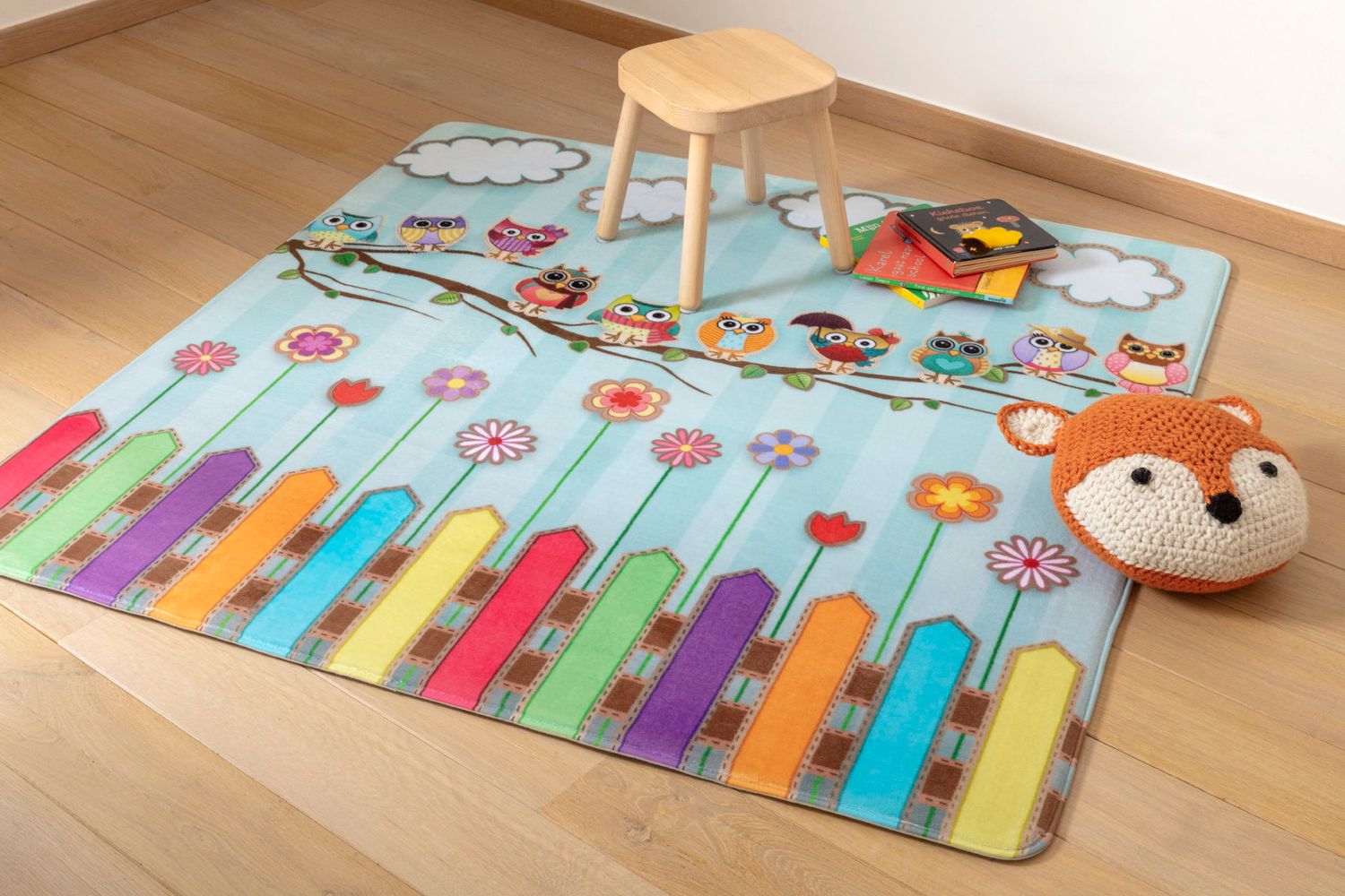 Uiltjes op stok kindertapijt