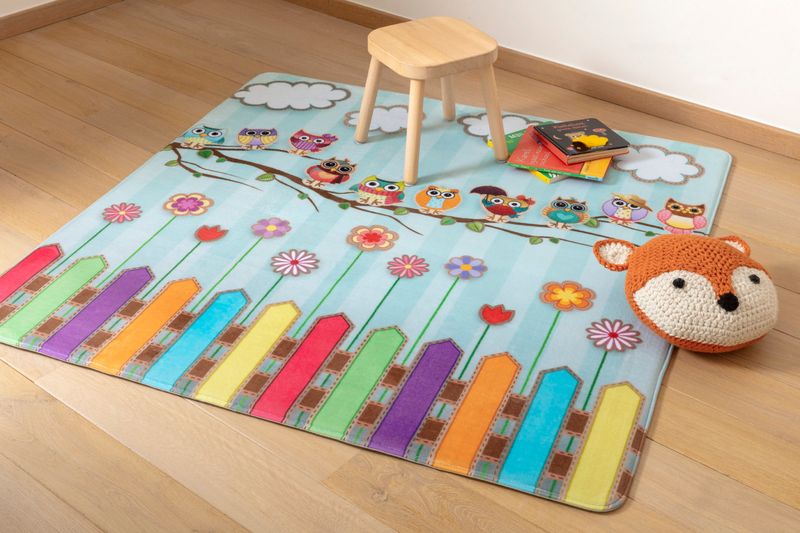 Uiltjes op stok kindertapijt