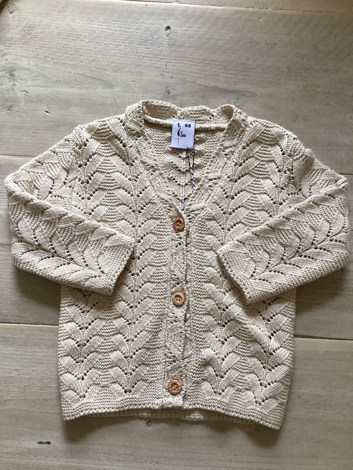 Cardigan em broderie beige