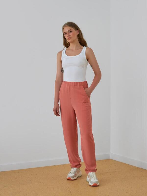 Легкие брюки на резинке персикового цвета