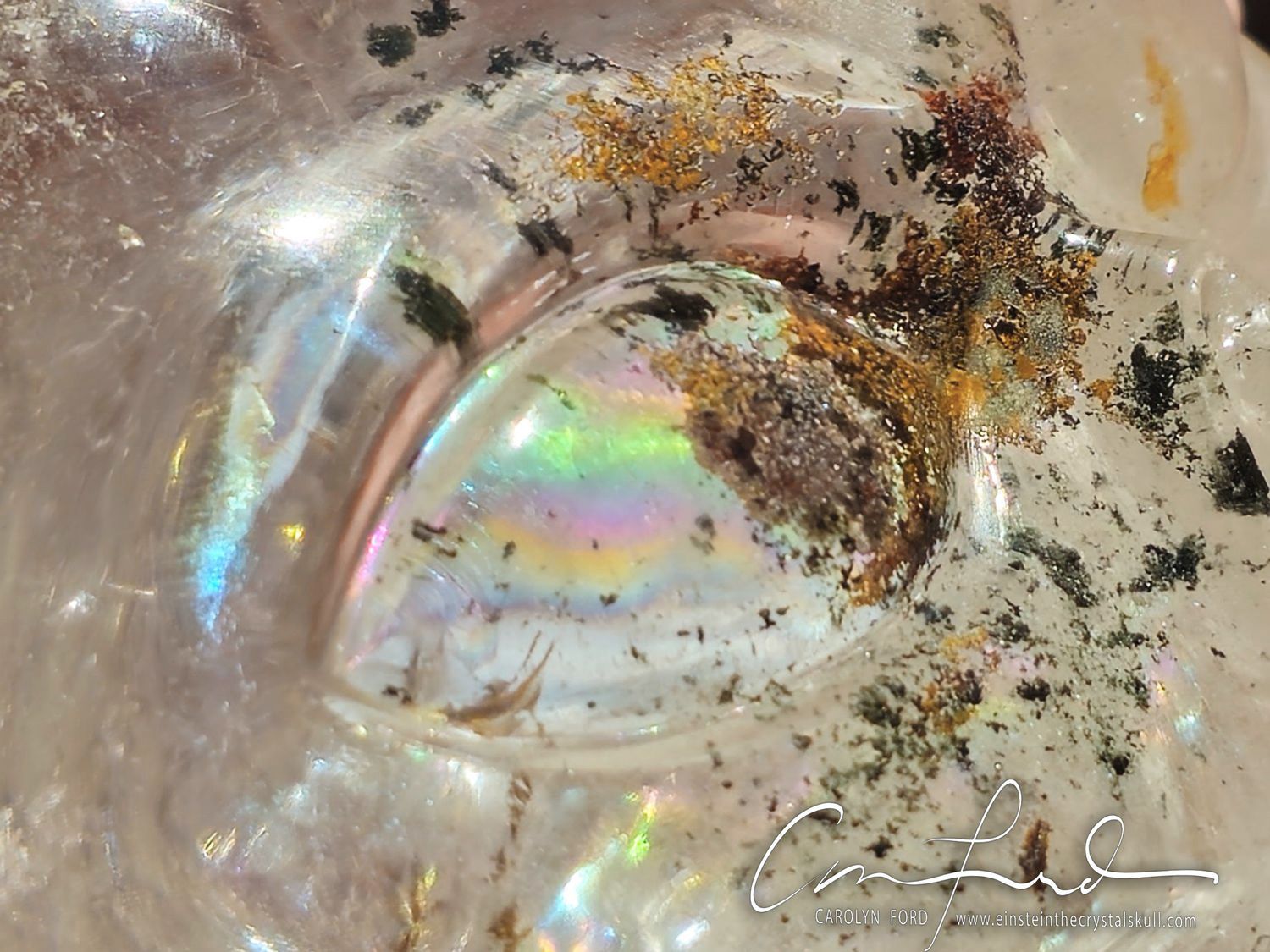 Clear Quartz Rainbow Skull with Chlorite and Iron.  Einstein Imprinted 'AMORE"