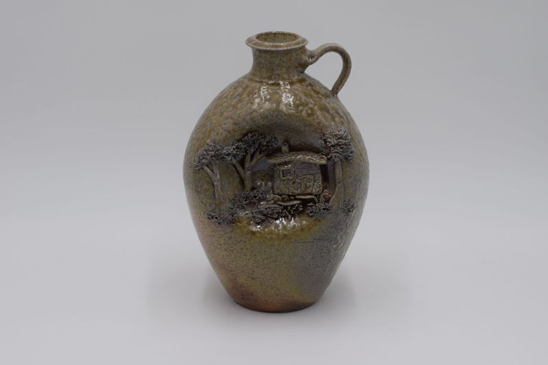 Woodfire cabin scene jug