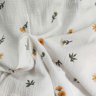 Mitwachshose Musselin - Sonnenblumen gestickt 