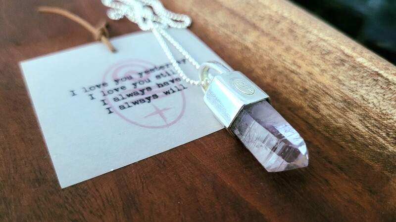 Punta de Amatista en cadena de plata de bolitas