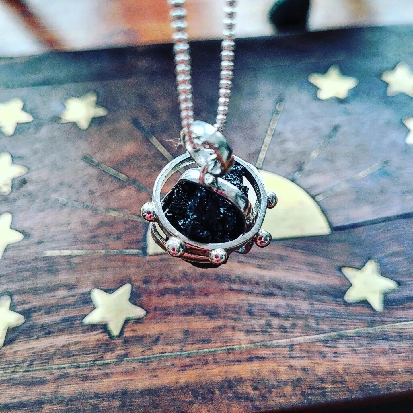 Amuleto de turmalina negra constelación