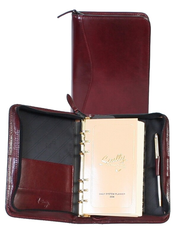 6 RING DAILY ORGANAZER 5 3/4" X 8"