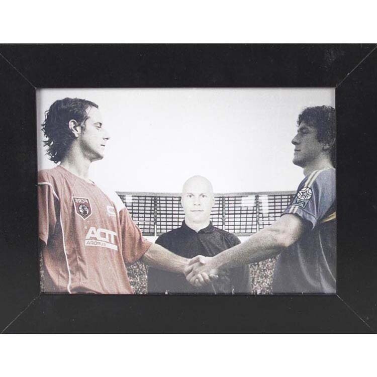 fotografija v okvirju - nogometni sodnik