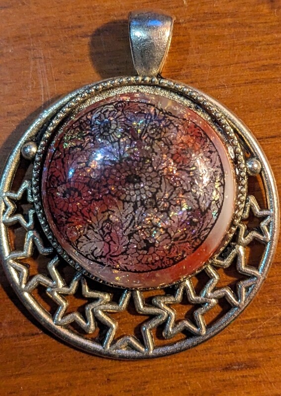 Red Stained Glass, Rainbow Dichroic Glass with a Black circle of flowers decal fused on the Pendant