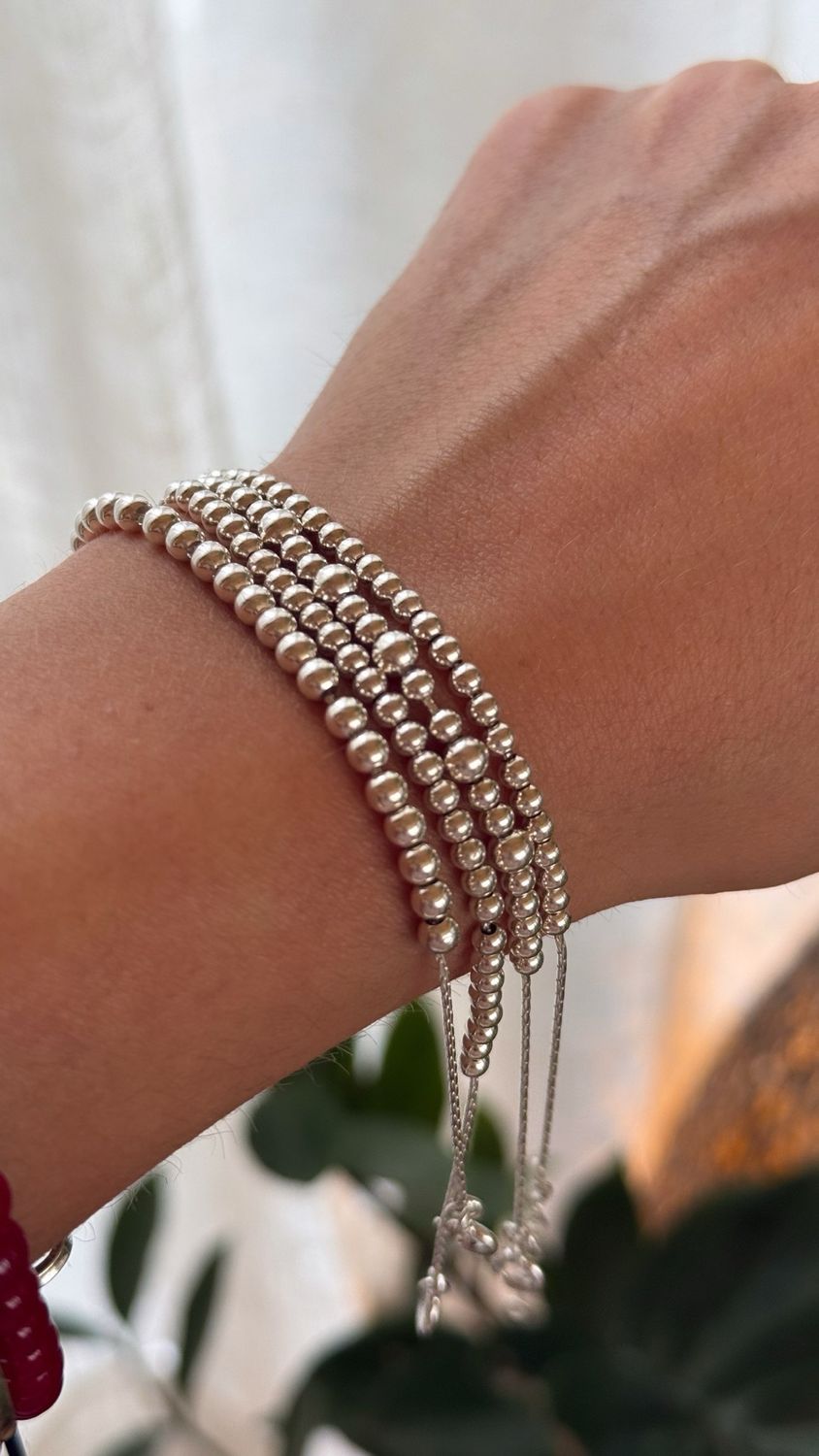 Pulsera cordón de plata, perlas movibles. *PLATA925*