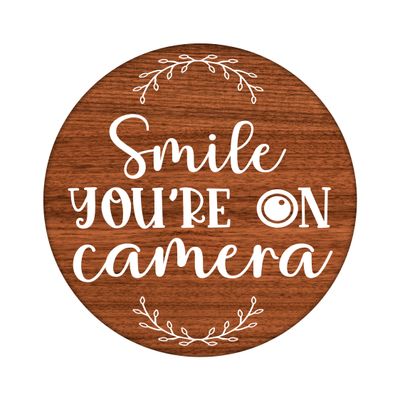 Smile You&#39;re on Camera Round Metal Sign