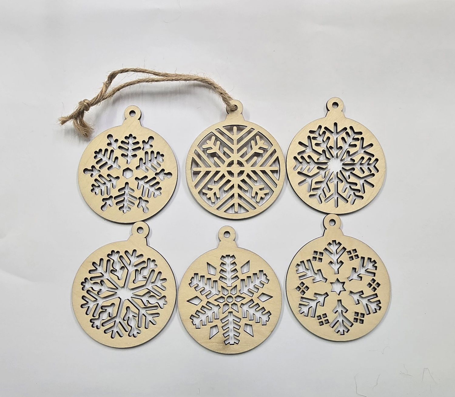 Pack of 6 assorted natural wood snowflake ornaments