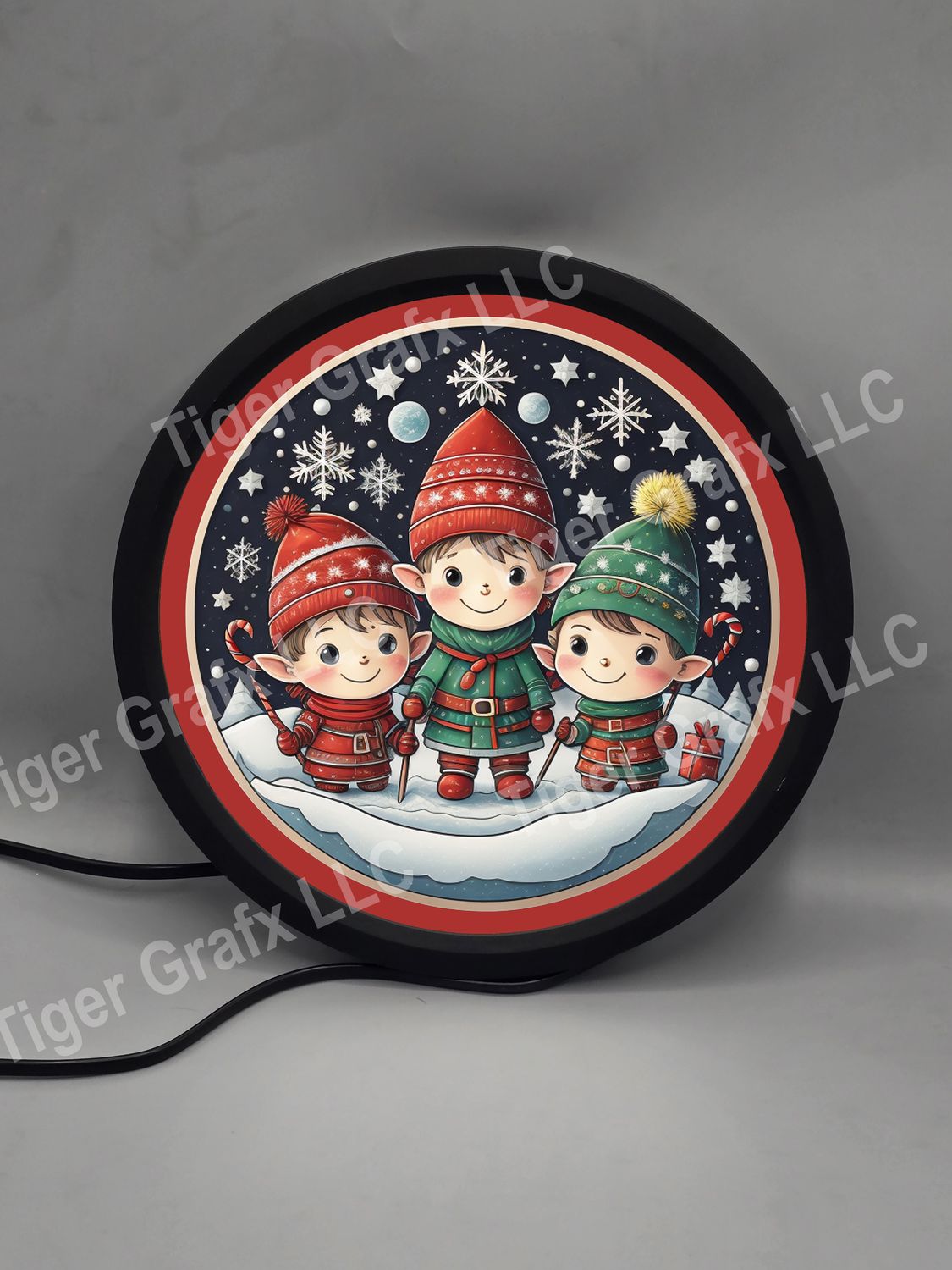 Santa&#39;s elves - illuminated round sign