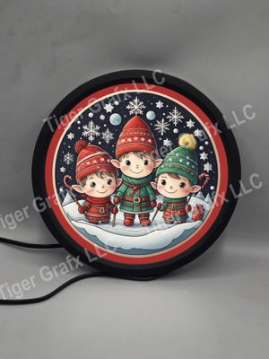 Santa&#39;s elves - illuminated round sign