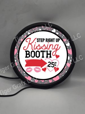 Kissing booth - illuminated round sign