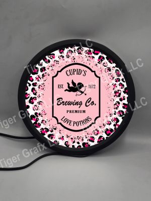 Cupid&#39;s brewing - illuminated round sign