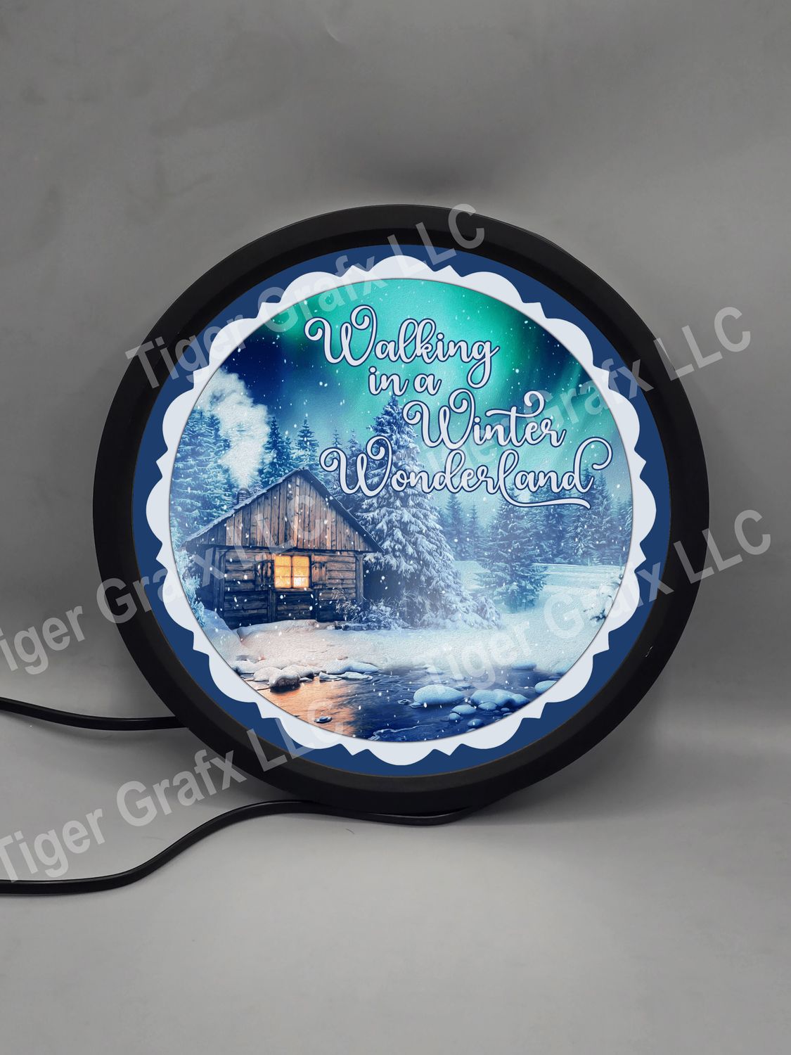 Winter wonderland cottage - illuminated round sign