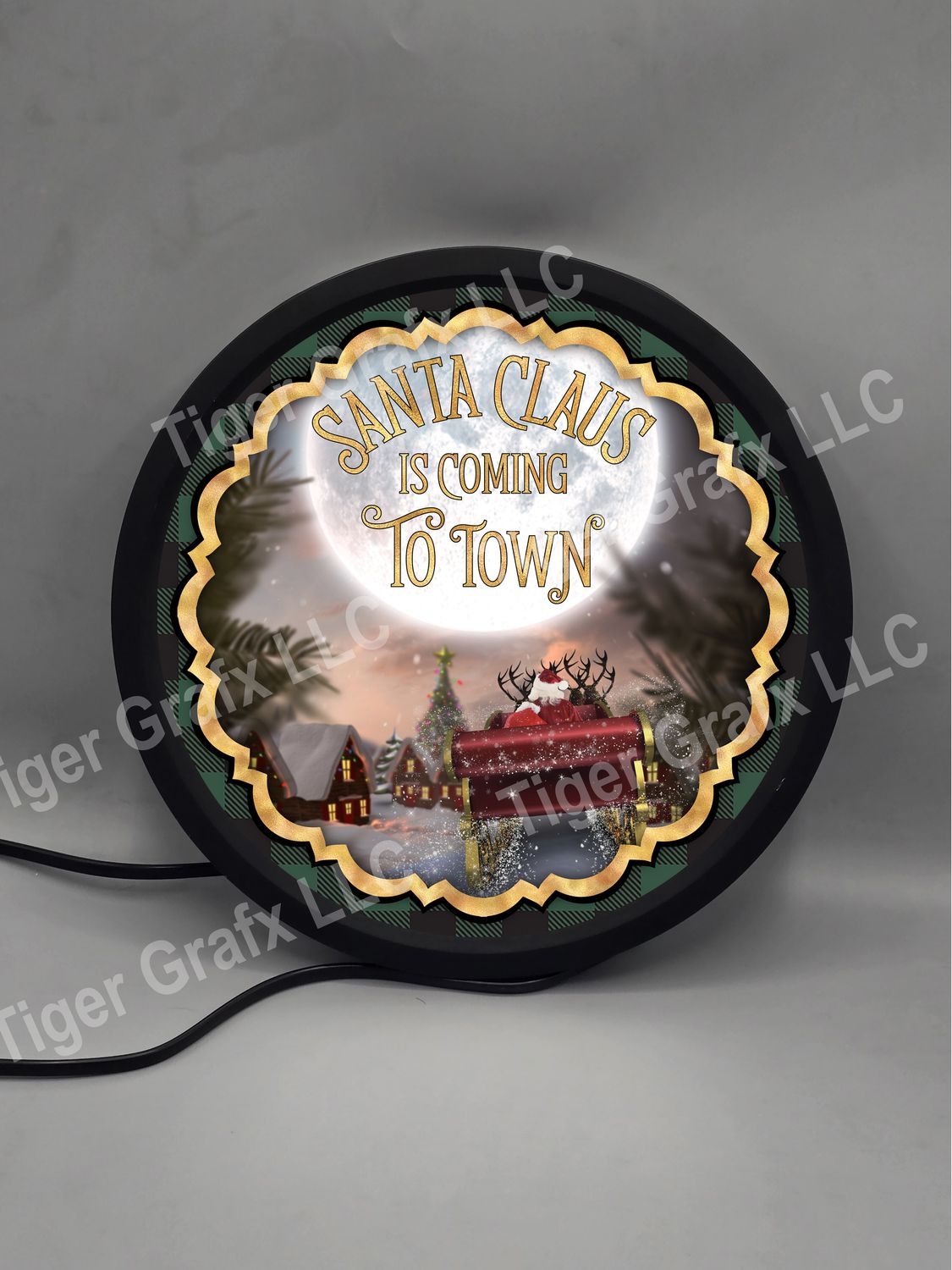 Santa Claus is coming to town - illuminated round sign
