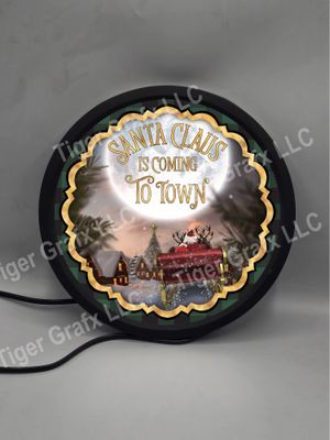 Santa Claus is coming to town - illuminated round sign