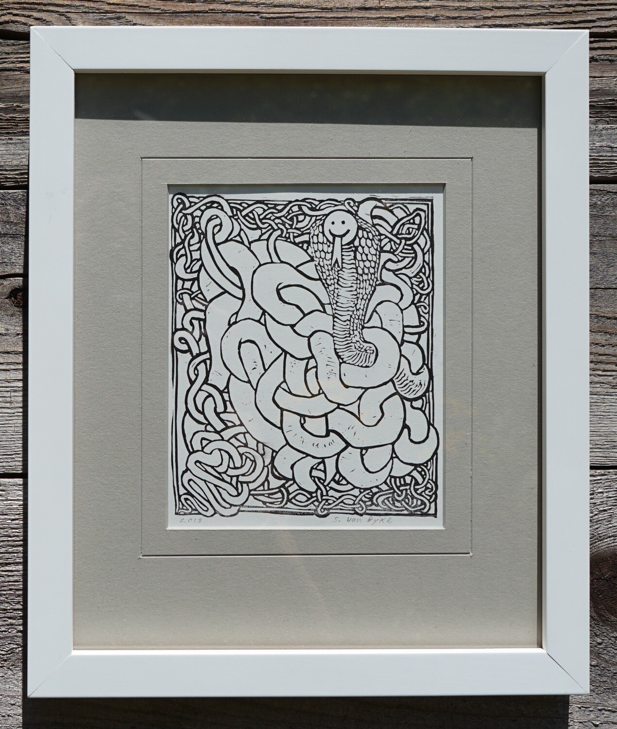 Smiling Snake, original block print, framed