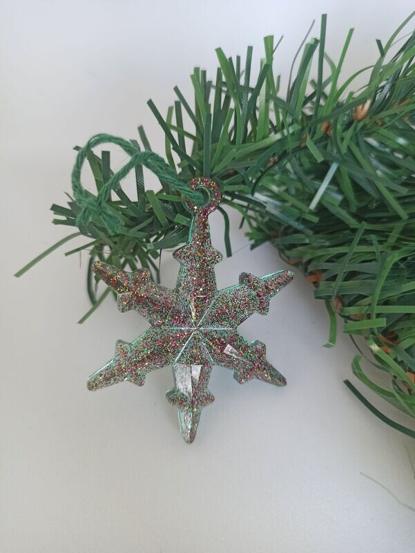 Fond vert paillettes multicolore