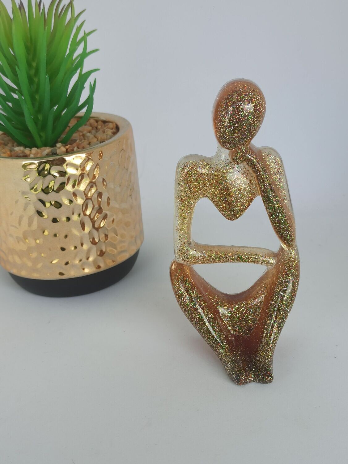 Figurine doré paillettes