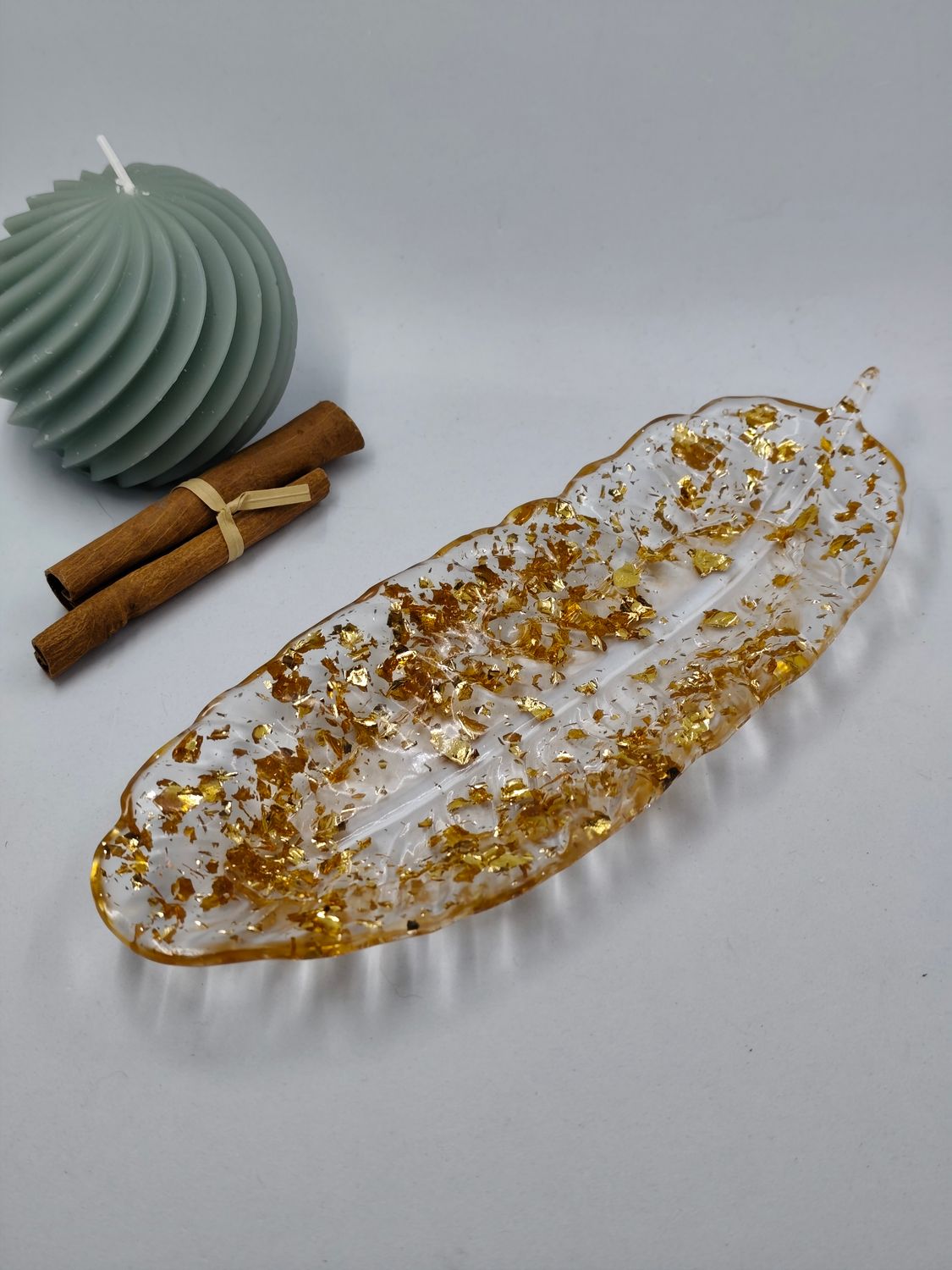 Vide poche plume doré Vide poche plume doré