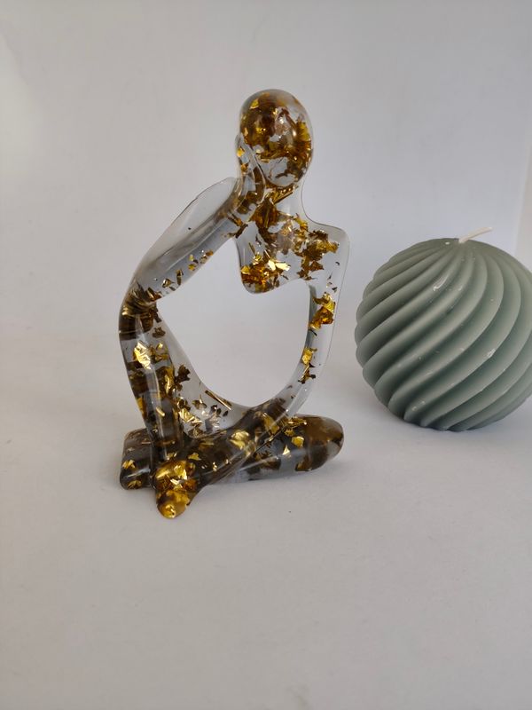 Figurine noir translucide/ doré paillettes Figurine noir translucide/ doré paillettes