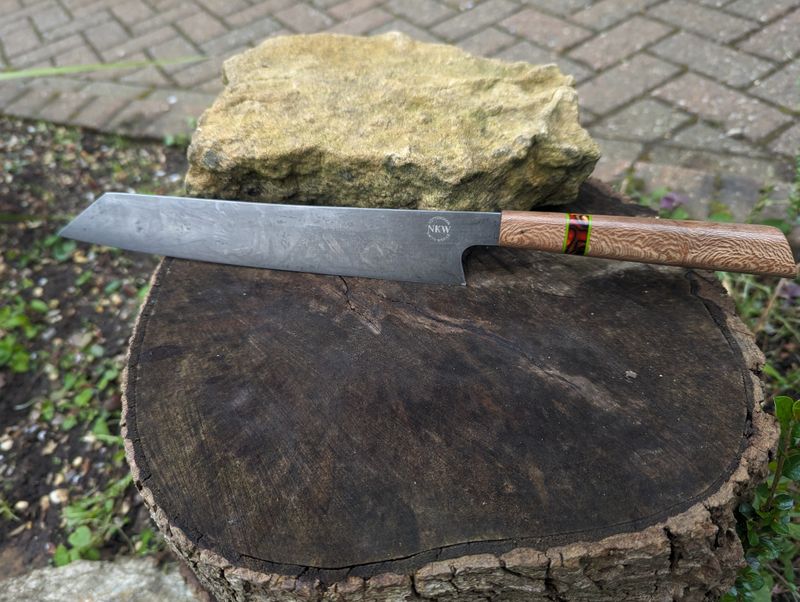 Handmade 9½" chef's knife, 80 CRV2 Carbon steel and Japanese style handle made from London plane, Kirinite bengal tiger and lime green spacers
