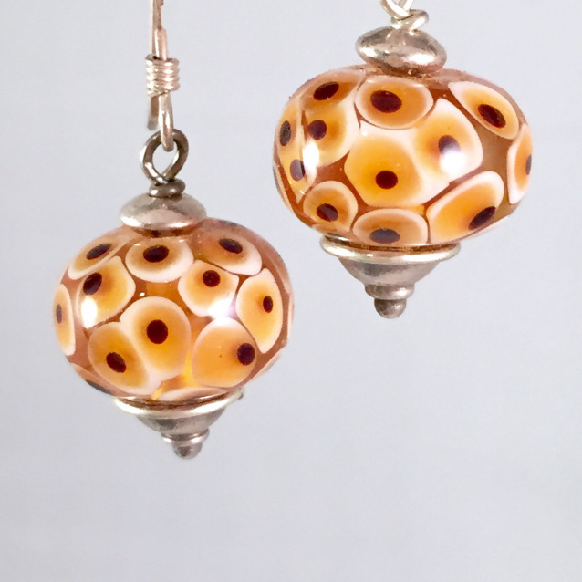 Spotted amber earrings