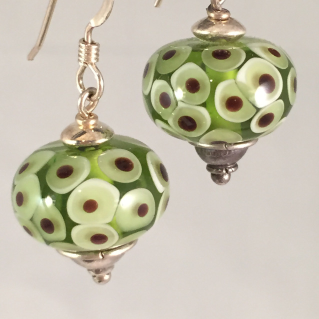 Green spotted earrings
