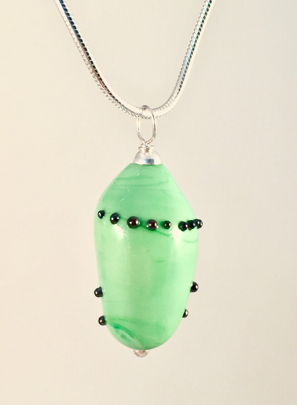Monarch chrysalis, early stage