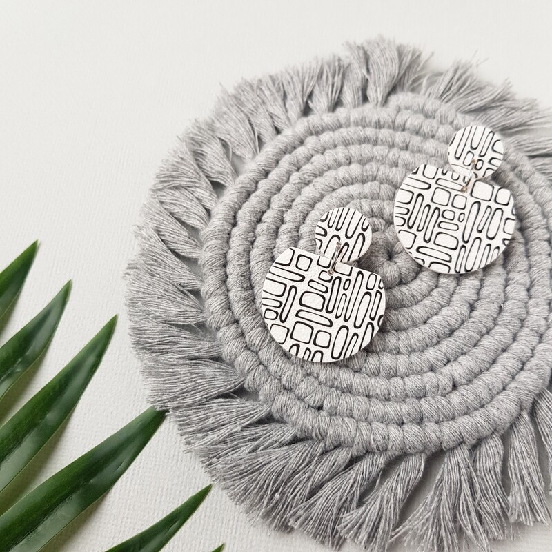 White statement earrings