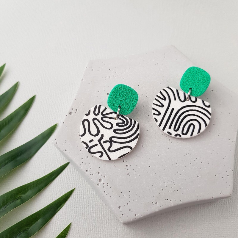 Green with black and white print earrings