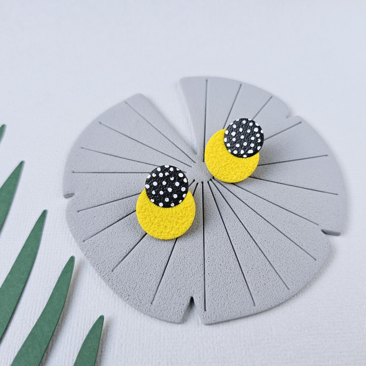 Small yellow polymer clay studs