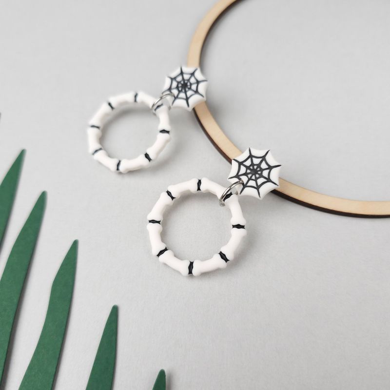 Spider Web and Bones Hoop Halloween Earrings