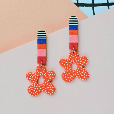 Long colourful earrings with dotted orange lower flowers