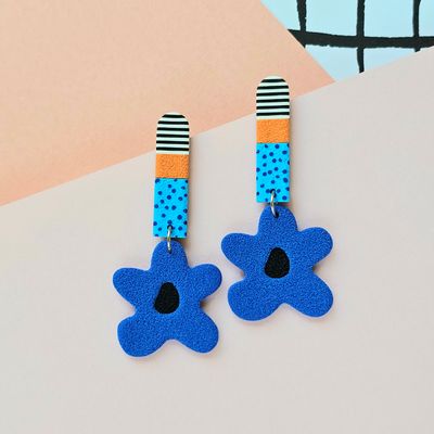 Long blue statement polymer clay earrings with blue flowers with black centres
