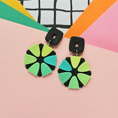 A pair of gradient green to blue statement earrings 
