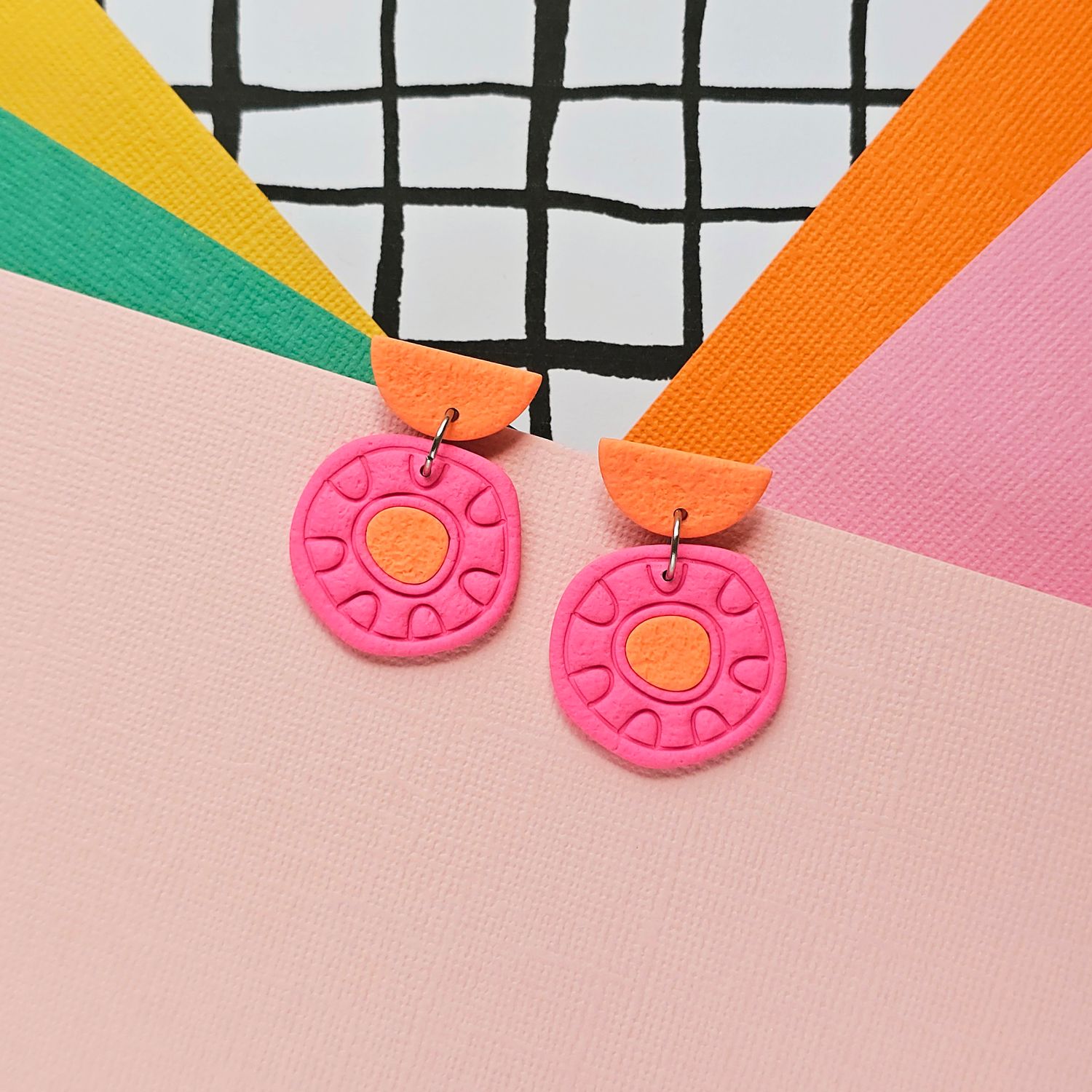 A pair of pink and orange cute polymer clay earrings