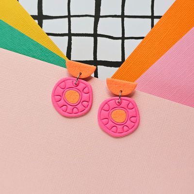 A pair of pink and orange cute polymer clay earrings