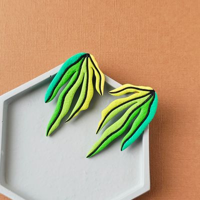 A pair of green gradient leaf polymer clay long studs