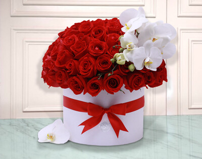 100 Rosas Rojas  y Orquidea en caja | ADELE