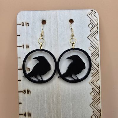 Raven’s Gaze” Acrylic Earrings – Black Silhouette on Gold Hooks