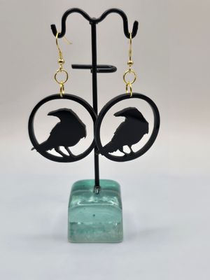 Raven’s Gaze” Acrylic Earrings – Black Silhouette on Gold Hooks