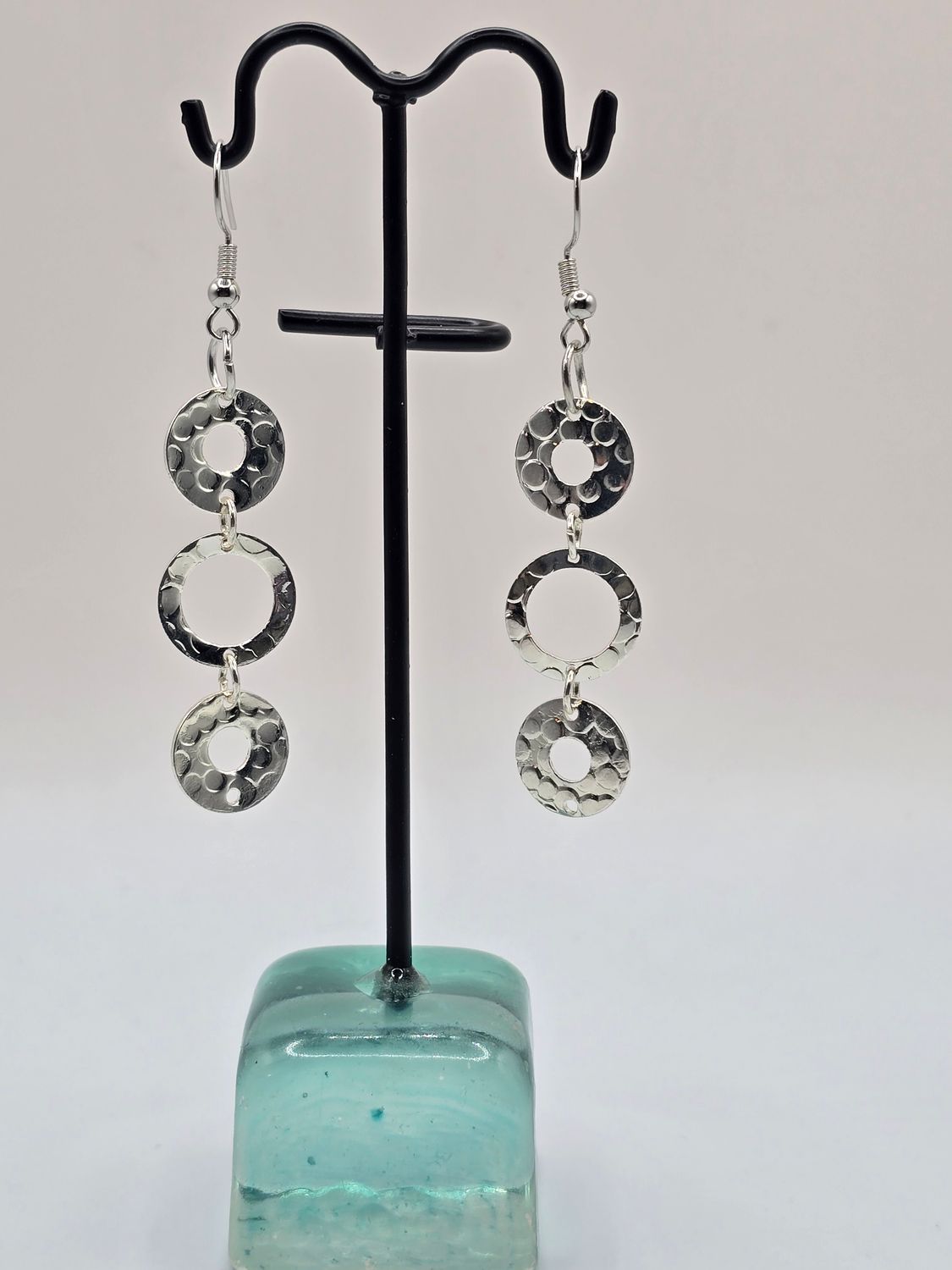 “Radiant Circles” Earrings – Hammered Silver Rings