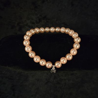 “Pearl Affection” Bracelet – Classic Pearls with Love Charm