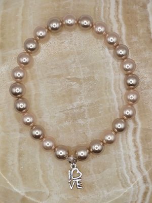 “Pearl Affection” Bracelet – Classic Pearls with Love Charm