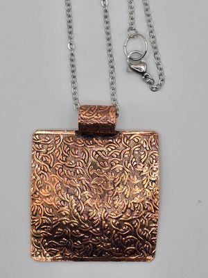 “Verdigris Echo” Embossed Copper Pendant Necklace